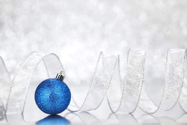 Christmas ball and ribbon — Stock Photo, Image