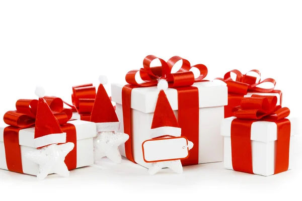 White gift boxes with red ribbons Stock Image
