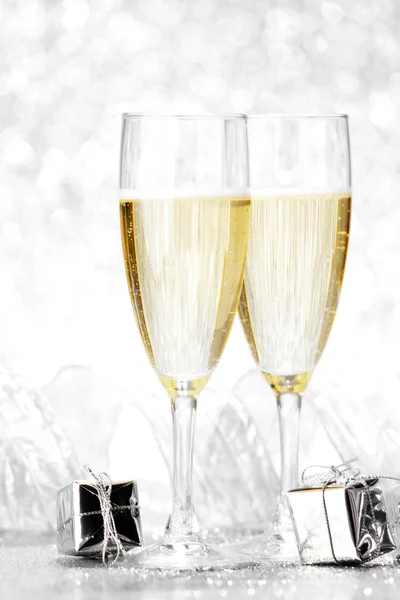 Champagne and gifts — Stock Photo, Image