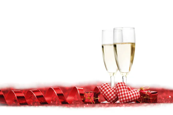 Champagne e decorazioni rosse — Foto Stock