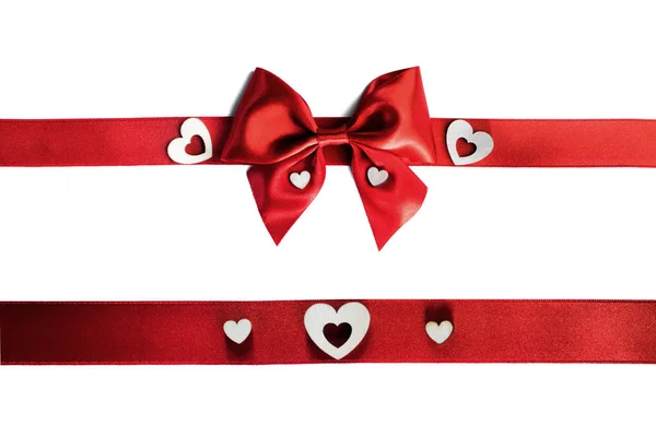 Red gift bow and hearts — Stock Photo, Image