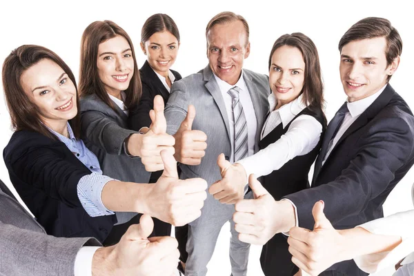 Equipo de negocios mostrando pulgar hacia arriba — Foto de Stock