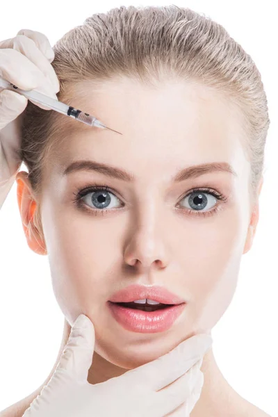 Cosmetic injection to female face Stock Image