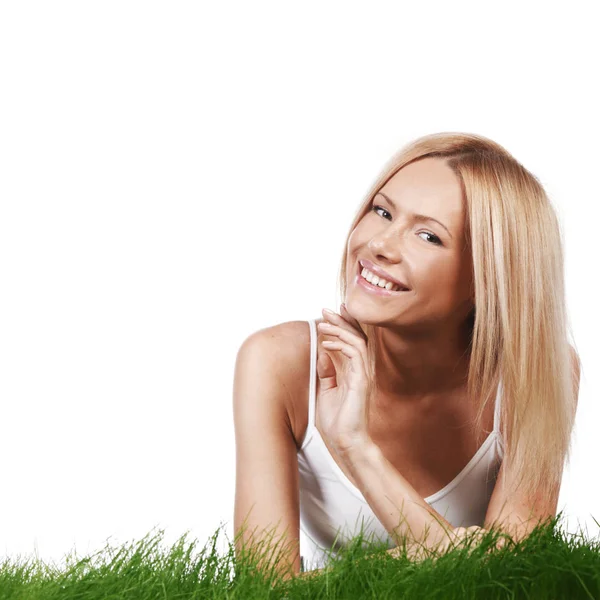 Smiling woman on grass Stock Image