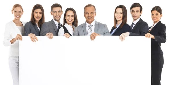 Business team holding blank billboard — Stock Photo, Image