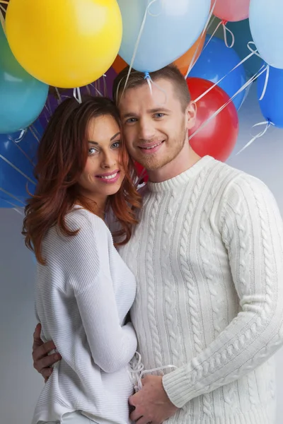 Couple with balloons — Stock Photo, Image