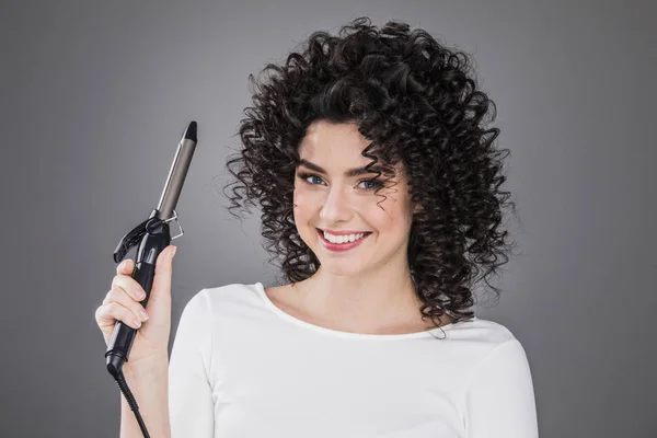 Woman with Curling Iron — Stock Photo, Image