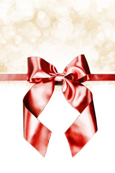 Red gift bow on white — Stock Photo, Image