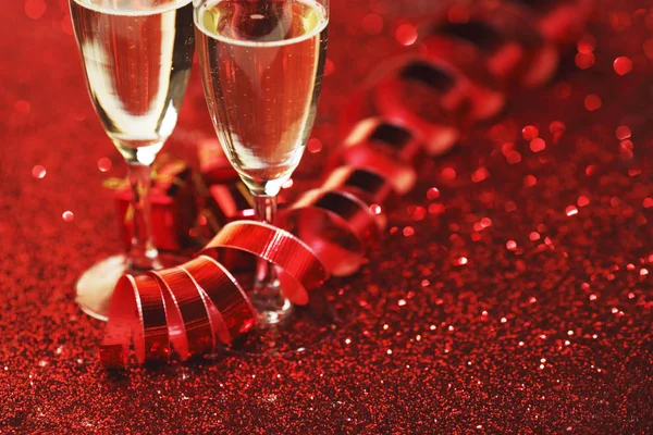 Champagne on glitters — Stock Photo, Image