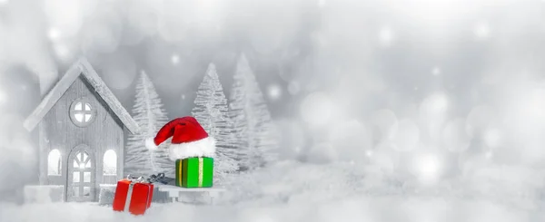 Tarjeta de Navidad con casa en nieve — Foto de Stock
