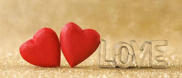 Houten harten en woord liefde — Stockfoto