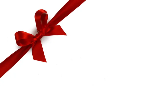 Red ribbon bow isolated on white — Stock Photo, Image