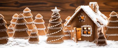 Gingerbread house and trees clipart