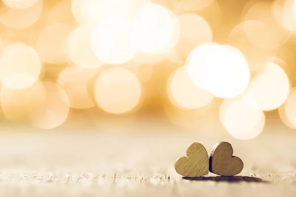 Dos corazones sobre fondo bokeh — Foto de Stock