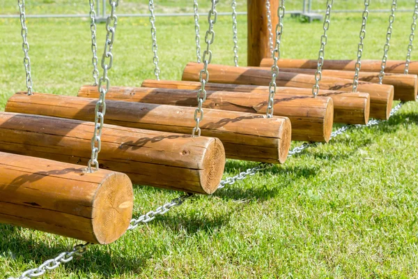 Childrens bridge made of logs and chains — Stock Photo, Image