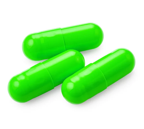 Πράσινα χάπια σε λευκό — Φωτογραφία Αρχείου