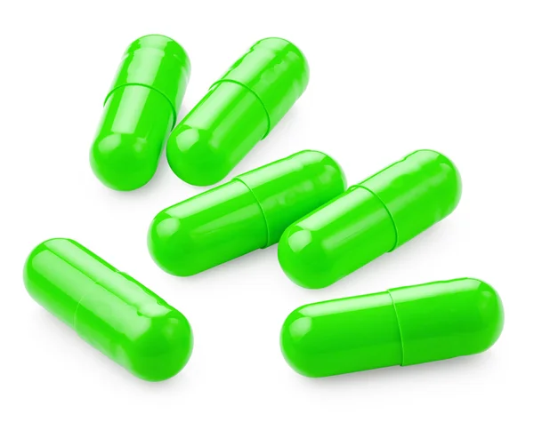Πράσινα χάπια σε λευκό — Φωτογραφία Αρχείου