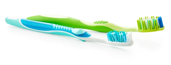 蓝色和绿色的牙刷 — 图库照片
