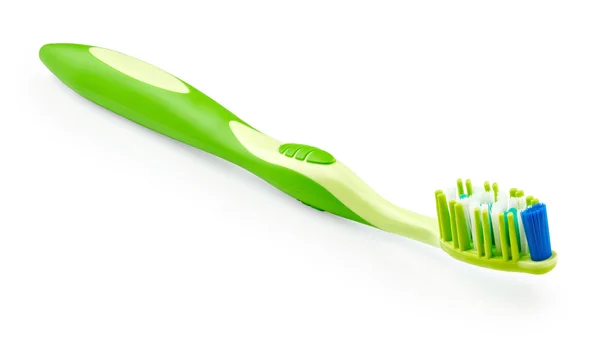 Brosse à dents verte sur blanc — Photo