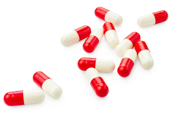 White and red capsules isolated — Stock Photo, Image
