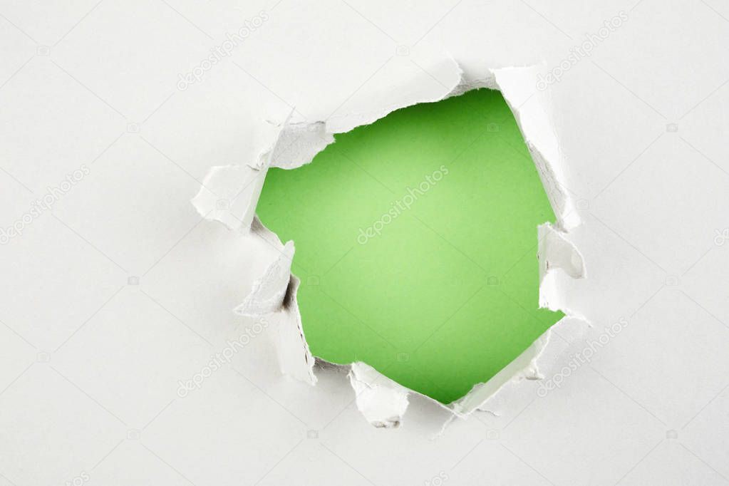 green hole in paper