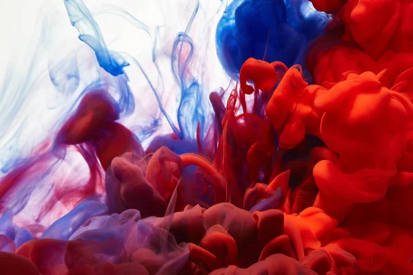 Splashes of blue and red paints — Stock Photo, Image