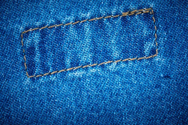 Текстура синей джинсы — стоковое фото