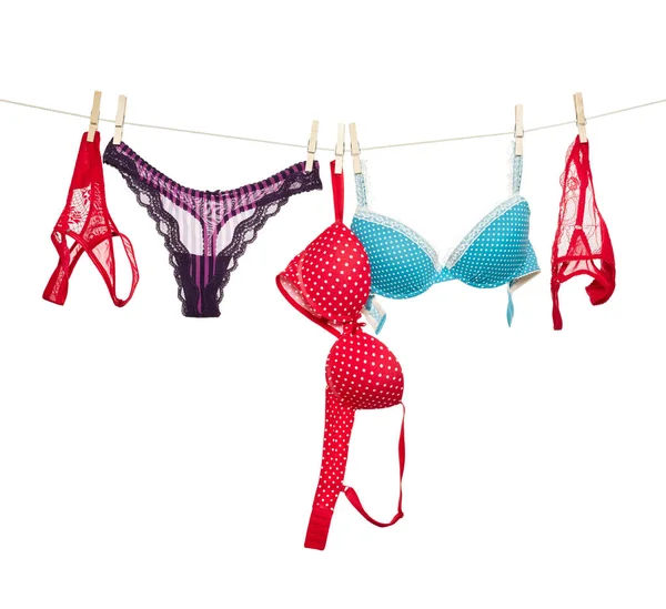 Female panties and bra on rope — Stock Photo, Image