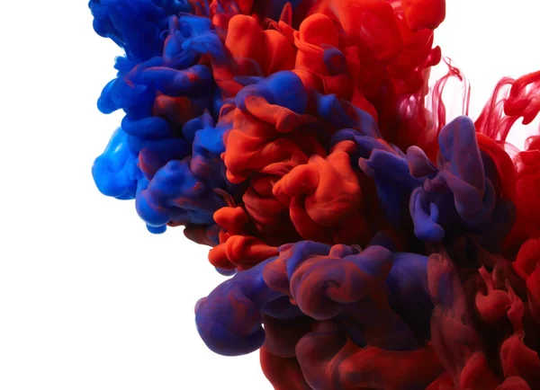Splash van blauwe en rode inkt — Stockfoto