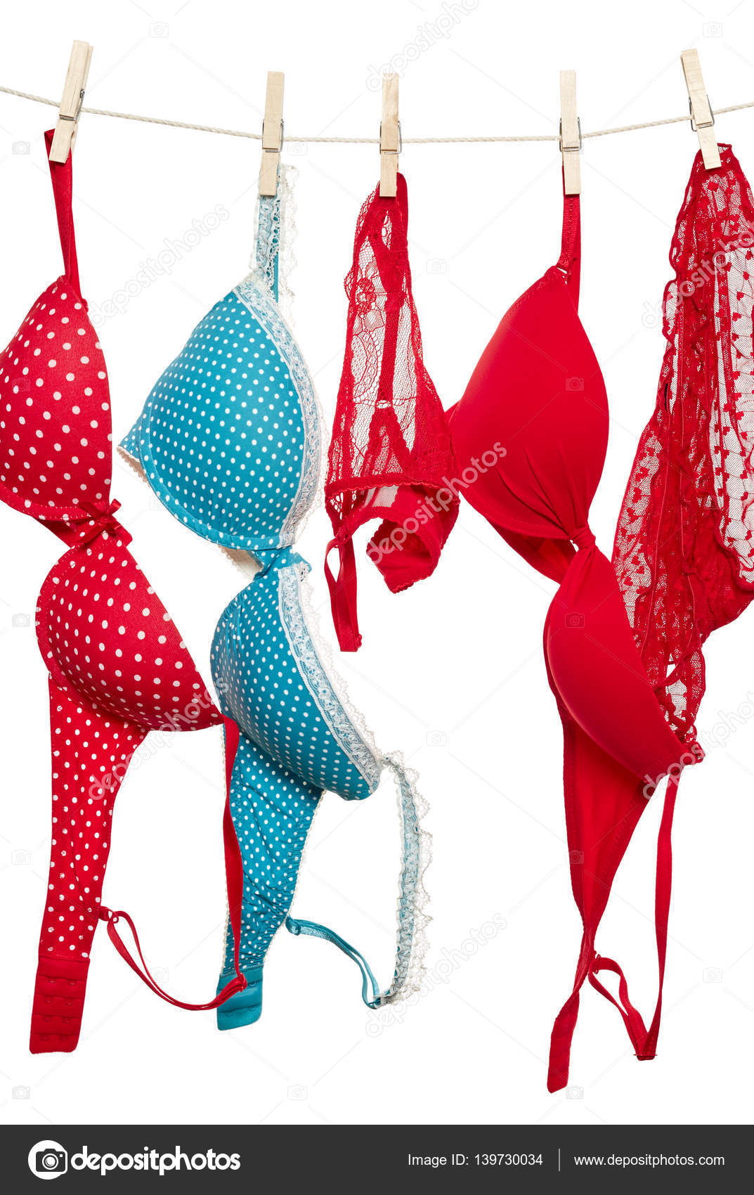 Female panties and bra on rope Stock Photo by ©Nik_Merkulov