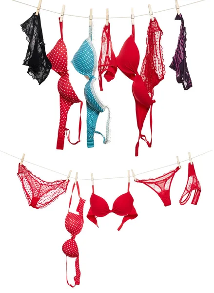 Female panties and bra on rope — Stock Photo, Image