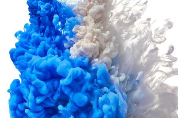 Всплеск синей и белой краски — стоковое фото