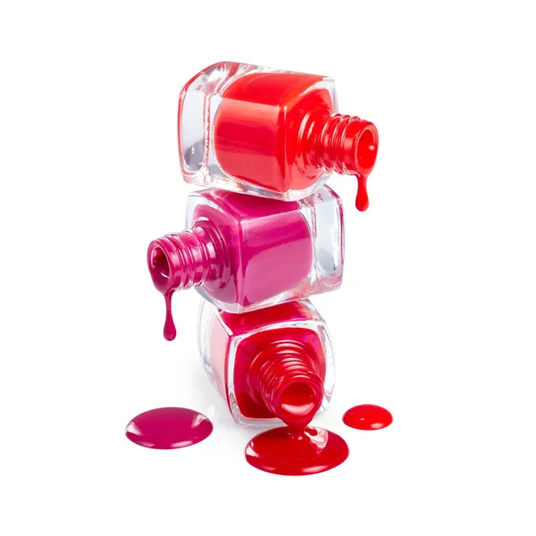 Nail polish dripping from bottles — Stock Photo, Image