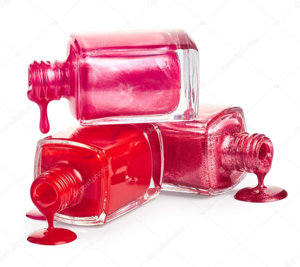 Nail polish dripping from bottles