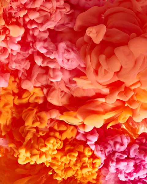 Orange und rosa Farbtropfen — Stockfoto