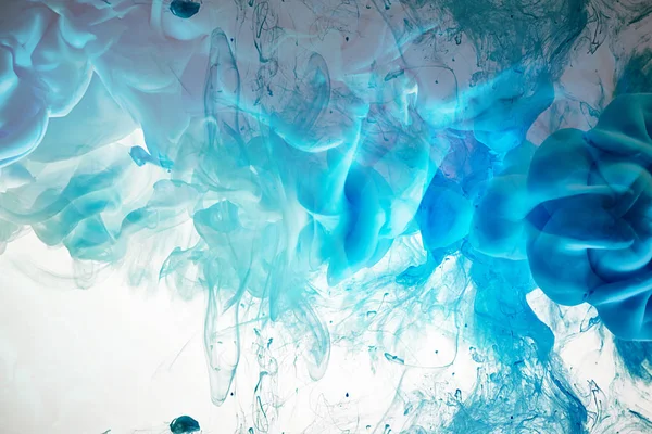 Turquoise ink in water — Stock Photo, Image