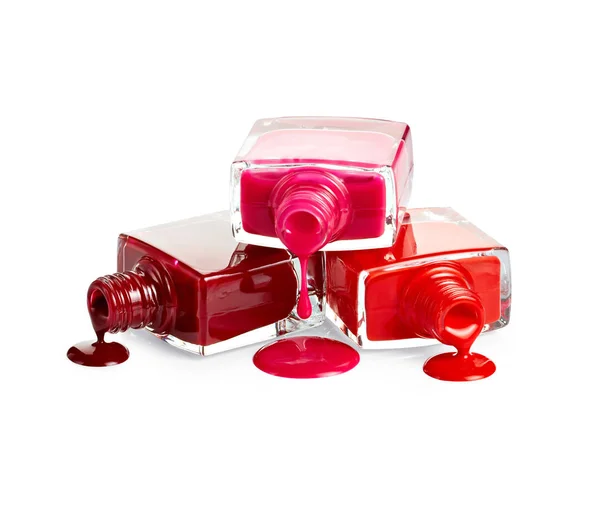 Bottles with spilled nail polish — Stock Photo, Image