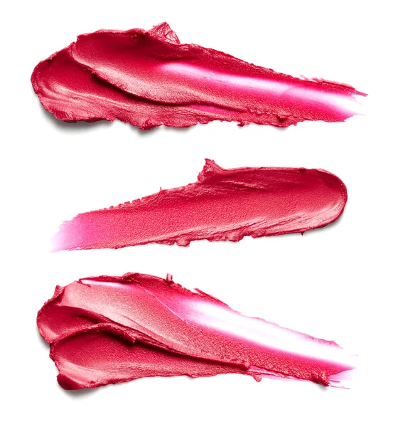 Coups de rouge à lèvres isolés sur fond blanc — Photo