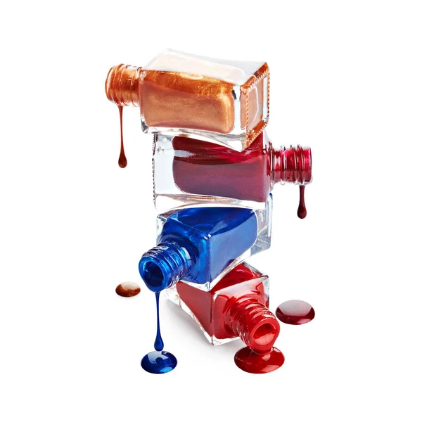 Flaschenstapel mit verschüttetem Nagellack — Stockfoto