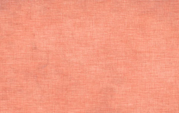 Vintage pink fabric texture. Old pink textured background. Color textile.