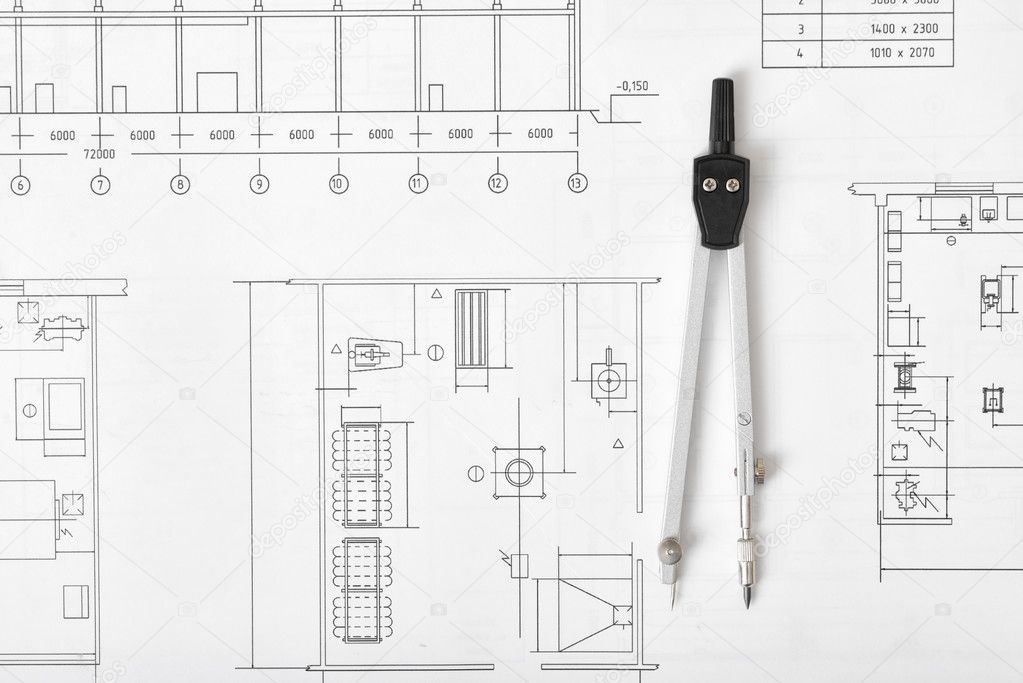 Compas De Génie Est Sur Un Plan Construction Photographie Compas De Génie Est Sur Un Plan Construction Photo