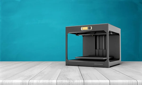 Impressora 3d preto em pé sobre mesa de madeira branca com fundo azul . — Fotografia de Stock