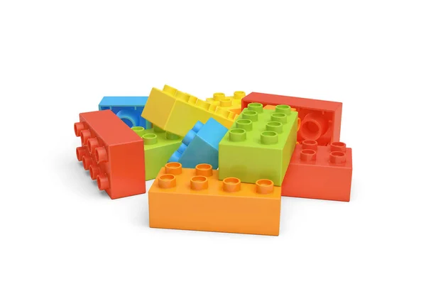 Rendu 3d de plusieurs briques LEGO colorées couchées sur fond blanc . — Photo