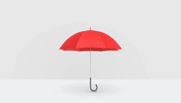 Sebuah payung merah klasik terbuka dengan pegangan vertikal ditempatkan pada latar belakang putih . — Stok Foto