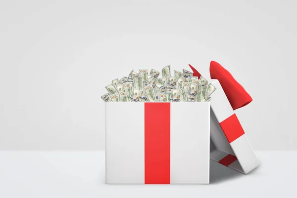 3d representación de una caja de regalo blanca con un lazo rojo lleno de billetes de 100 dólares sobre fondo blanco . — Foto de Stock