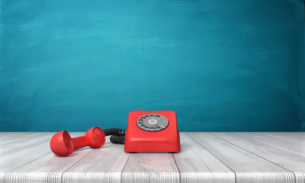 3D renderização de um telefone de discagem vermelho brilhante em pé sobre uma mesa de madeira e um fundo de parede azul . — Fotografia de Stock