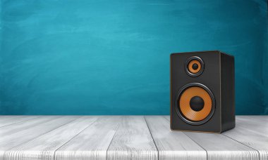 3d rendering of a one black speaker box with orange trim standing on a wooden table in front of a blue background. clipart