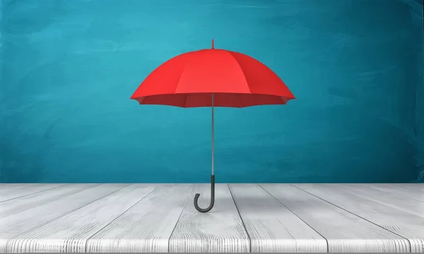 3d rendu d'un seul parapluie classique rouge avec une verrière ouverte debout au-dessus d'un bureau en bois sur fond bleu . — Photo