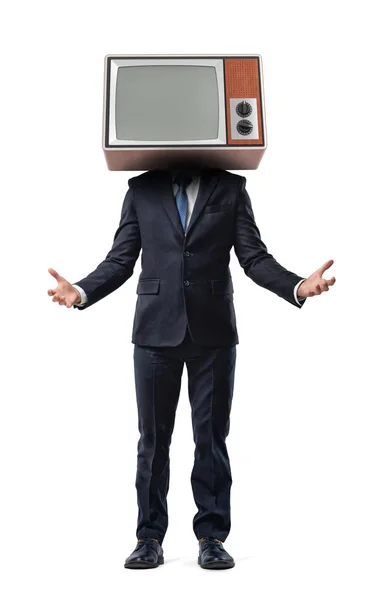 Ein Geschäftsmann, der einen alten Fernseher auf dem Kopf trägt, hat die Arme in einladender Geste hochgelegt. — Stockfoto