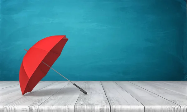 3d rendu d'un seul parapluie ouvert rouge couché sur le côté avec une verrière ouverte sur une surface en bois sur fond bleu . — Photo